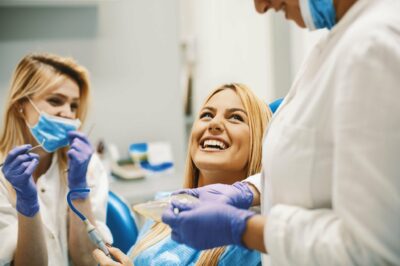 Young blonde woman at the dentist office.