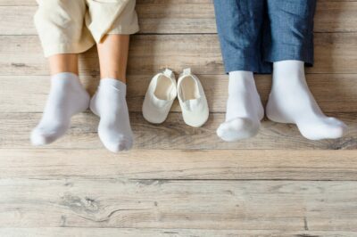 Socks of woman and man with baby socks in between