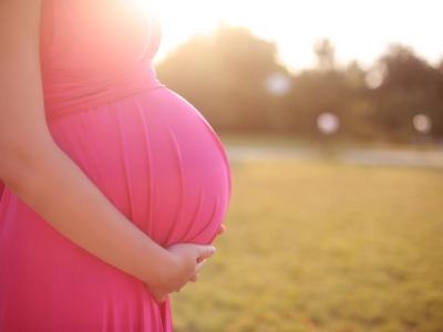 pregnant-belly-bright-pink-dress